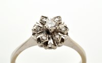 Lot 818 - A diamond cluster ring, of snowflake design,...