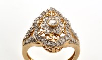 Lot 830 - A diamond dress ring, set throughout with...