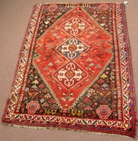 Lot 865 - A mid 20th Century Shiraz rug, with triple...