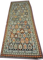 Lot 870 - A large Kilim rug, decorated in pinks, oranges...