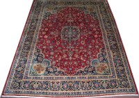 Lot 871 - A Kashmar carpet, the field with claret ground,...