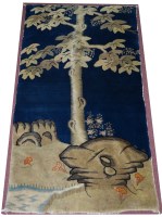 Lot 873 - An early 20th Century Chinese rug, with...