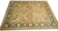Lot 878 - A modern Heriz style carpet, with floral...