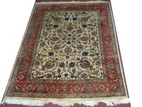 Lot 886 - A Tabriz style rug, the field decorated with...