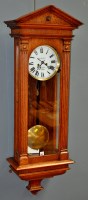 Lot 900 - A Viennese oak wall clock, the painted roman...