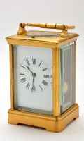 Lot 901 - A French gilt brass repeating carriage clock,...