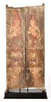 Lot 904 - A pair of painted Javanese Buddhist door...