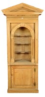 Lot 905 - A pine alcove cupboard surmounted by an arched...