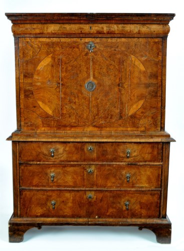 Lot 924 - An early walnut secretaire, with a flared...