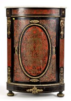 Lot 927 - A 19th Century French bowfront ebonised corner...