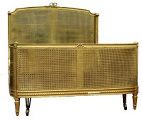 Lot 935 - A Louis XV style giltwood bergere double bed,...