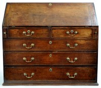 Lot 951 - A George III mahogany bureau with rectangular...