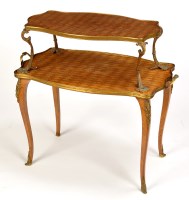 Lot 965 - A French walnut and kingwood inlaid two-tier...