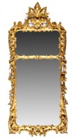 Lot 966 - A George III giltwood pier glass, with twin...