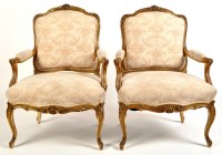 Lot 967 - A pair of Louise XV style giltwood armchairs,...