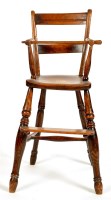 Lot 974 - A 19th Century child's elm Windsor style high...