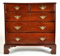 Lot 975 - A Georgian mahogany chest of two short and...