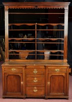 Lot 991 - A breakfront and oak dresser, with three-tier...