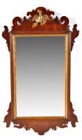 Lot 1005 - A late George III parcel gilt wall mirror with...