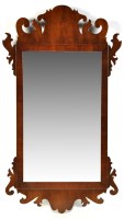 Lot 1006 - A Georgian style mahogany wall mirror with...