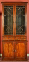 Lot 1008 - A late Victorian walnut tall bookcase cabinet,...