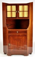 Lot 1015 - A German mahogany standing corner cabinet,...