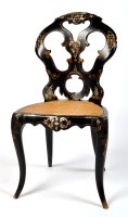 Lot 1029 - A Victorian papier mache ebonised cane seat...