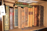 Lot 646 - A collection of old leather bound books,...