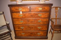 Lot 1092 - A Victorian figured walnut chest of two short...