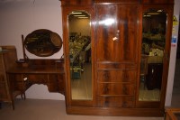 Lot 645 - An Edwardian inlaid mahogany two-piece bedroom...
