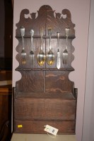 Lot 823 - A late 18th Century oak spoon rack, with...