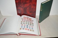 Lot 66 - A box containing World stamps in eight albums.