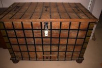 Lot 585 - A large stained wooden storage box, with...