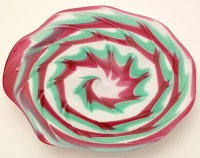 Lot 1012 - A modern polygonal glass dish, with red, green...