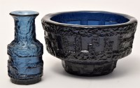 Lot 1047 - A textured navy blue bowl in the style of Ruda...