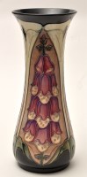 Lot 1103 - Moorcroft: a waisted form vase with foxglove...