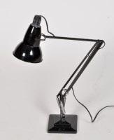 Lot 1129 - A black metal table-top anglepoise lamp on...