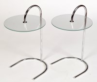 Lot 1138 - A pair of modern chromed metal and glass...