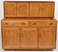 Lot 1157 - Ercol: and elm sideboard, the superstructure...