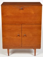 Lot 1193 - Avalon: a mid 20th Century teak cabinet, with...
