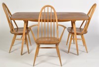 Lot 1218 - Ercol: a light elm and beech wood dining table,...