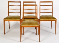 Lot 1236 - Four mid 20th Century teak ladder back dining...