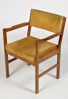 Lot 1238 - A Danish style teak elbow chair, with padded...