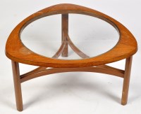 Lot 1252 - A mid 20th Century shaped triangular teak...