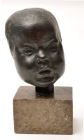 Lot 1417 - Manner of Jacob Epstein: mask of a baby,...