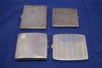 Lot 504 - Four silver cigarette cases with engine turned...
