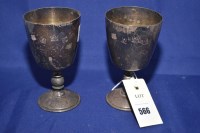 Lot 566 - A pair of silver goblets, engraved to...
